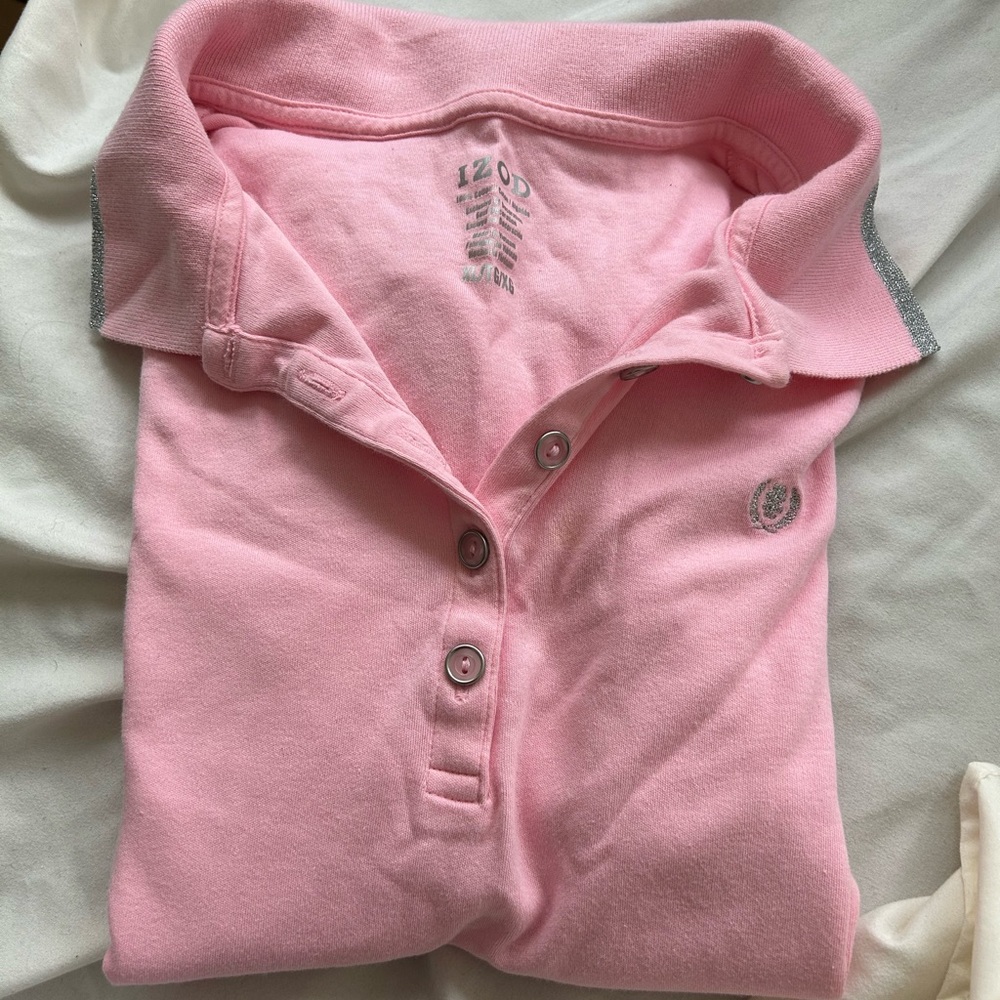Soft pink IZOD polo shirt.